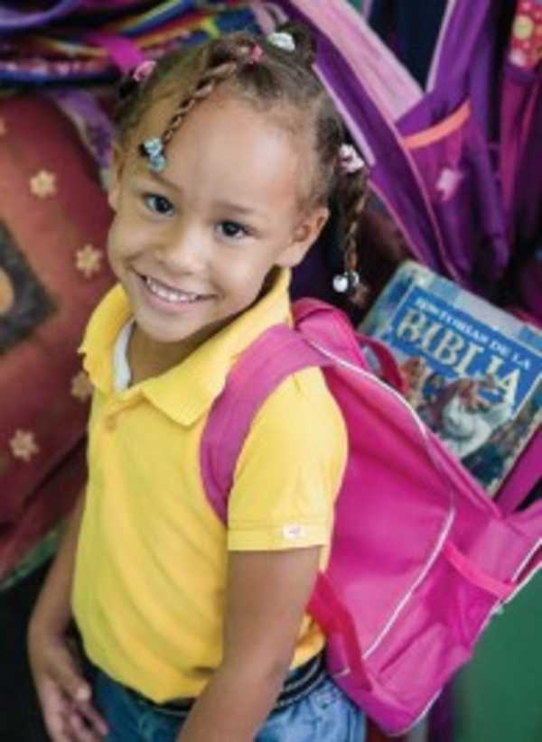 Backpack with school supplies and a Bible 